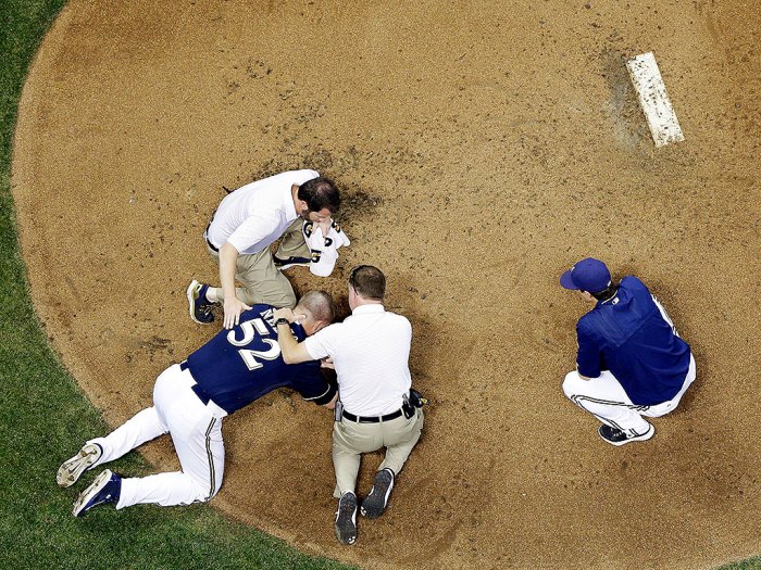 Payton henry triple a catcher hospitalized after being hit in head with backswing