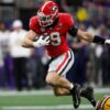 Nfl draft rumors brock bowers to visit aaron rodgers jets amid buzz on no 10 pick