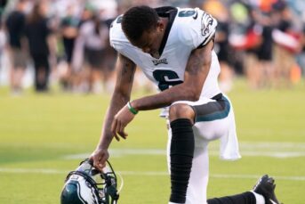 Eagles devonta smith seen on crutches in walking boot after injury vs cardinals