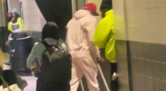 Eagles devonta smith seen on crutches in walking boot after injury vs cardinals